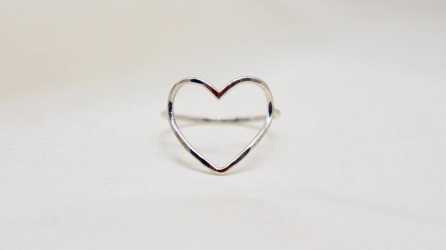 An expression of love, the symbol of the heart is great to wear for one's self love or for a beloved. hammered texture 14k gold filled, rose gold filled or 92.5 sterling silver handmade in Los Angeles