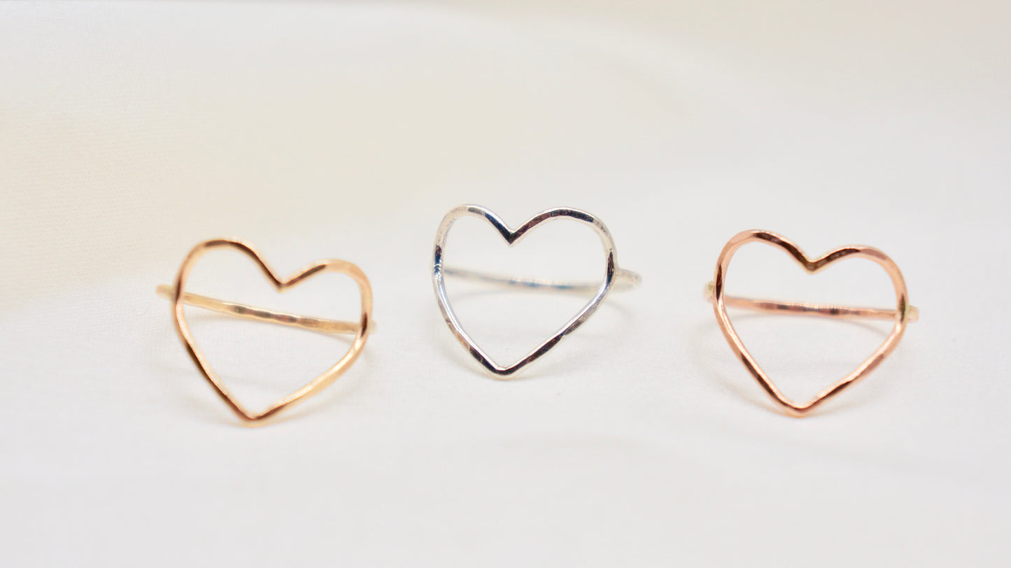 An expression of love, the symbol of the heart is great to wear for one's self love or for a beloved. hammered texture 14k gold filled, rose gold filled or 92.5 sterling silver handmade in Los Angeles