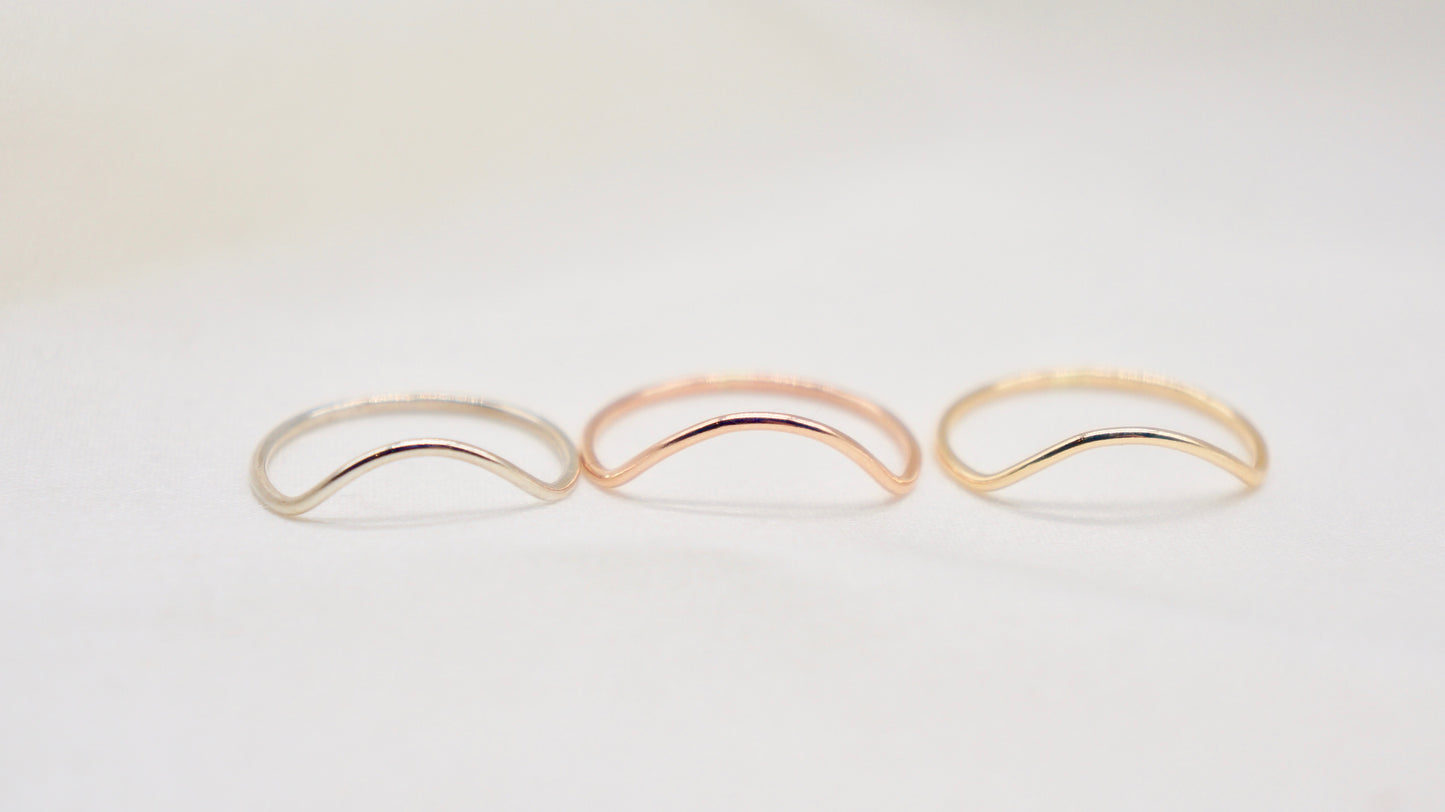 With a simple arc, the Arc ring adds a flair to your ring stack. hammered texture 14k gold filled, rose gold filled or 92.5 sterling silver handmade in Los Angeles