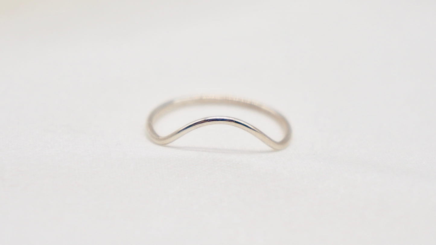 With a simple arc, the Arc ring adds a flair to your ring stack. hammered texture 14k gold filled, rose gold filled or 92.5 sterling silver handmade in Los Angeles