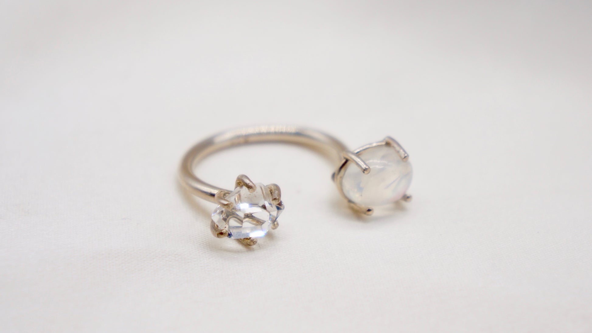 Herkimer diamond and moonstone ring.  smooth ring texture 92.5 sterling silver handmade in Los Angeles Please note: Available made to order, 2-3 weeks.