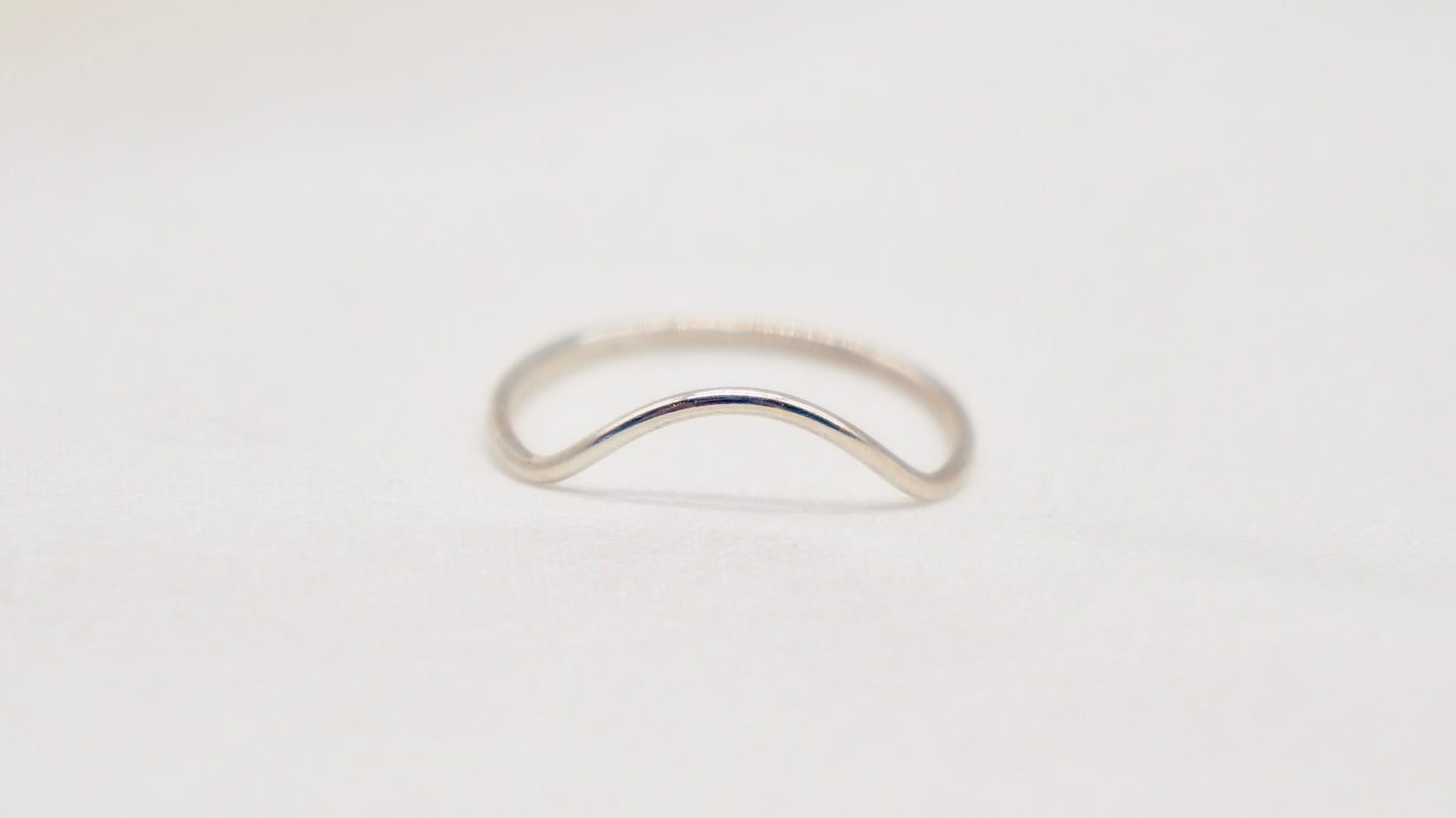 With a simple arc, the Arc ring adds a flair to your ring stack.   hammered texture 14k gold filled, rose gold filled or 92.5 sterling silver handmade in Los Angeles 